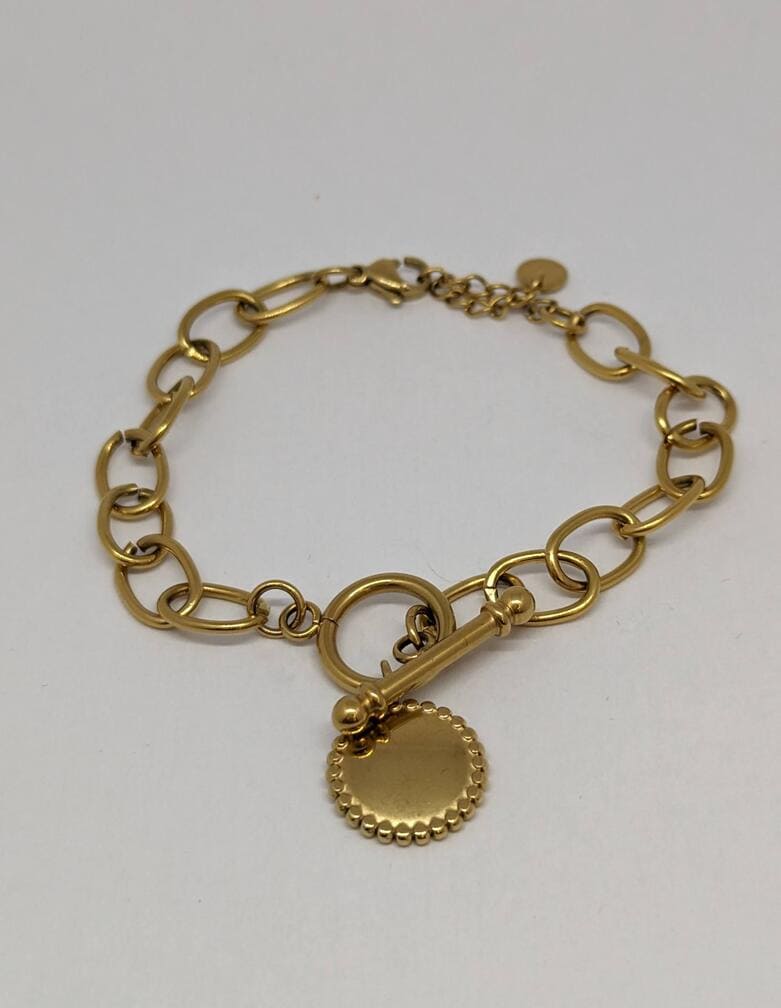 Bracelet femme, gourmette femme doré tendance, fermoir devant original.